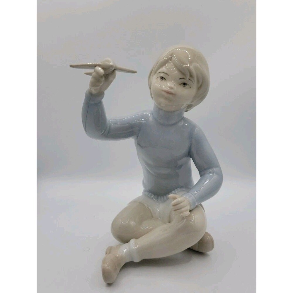 Vintage Signed Porceval Boy Holding Plane Made in Spain 6.5" Tall